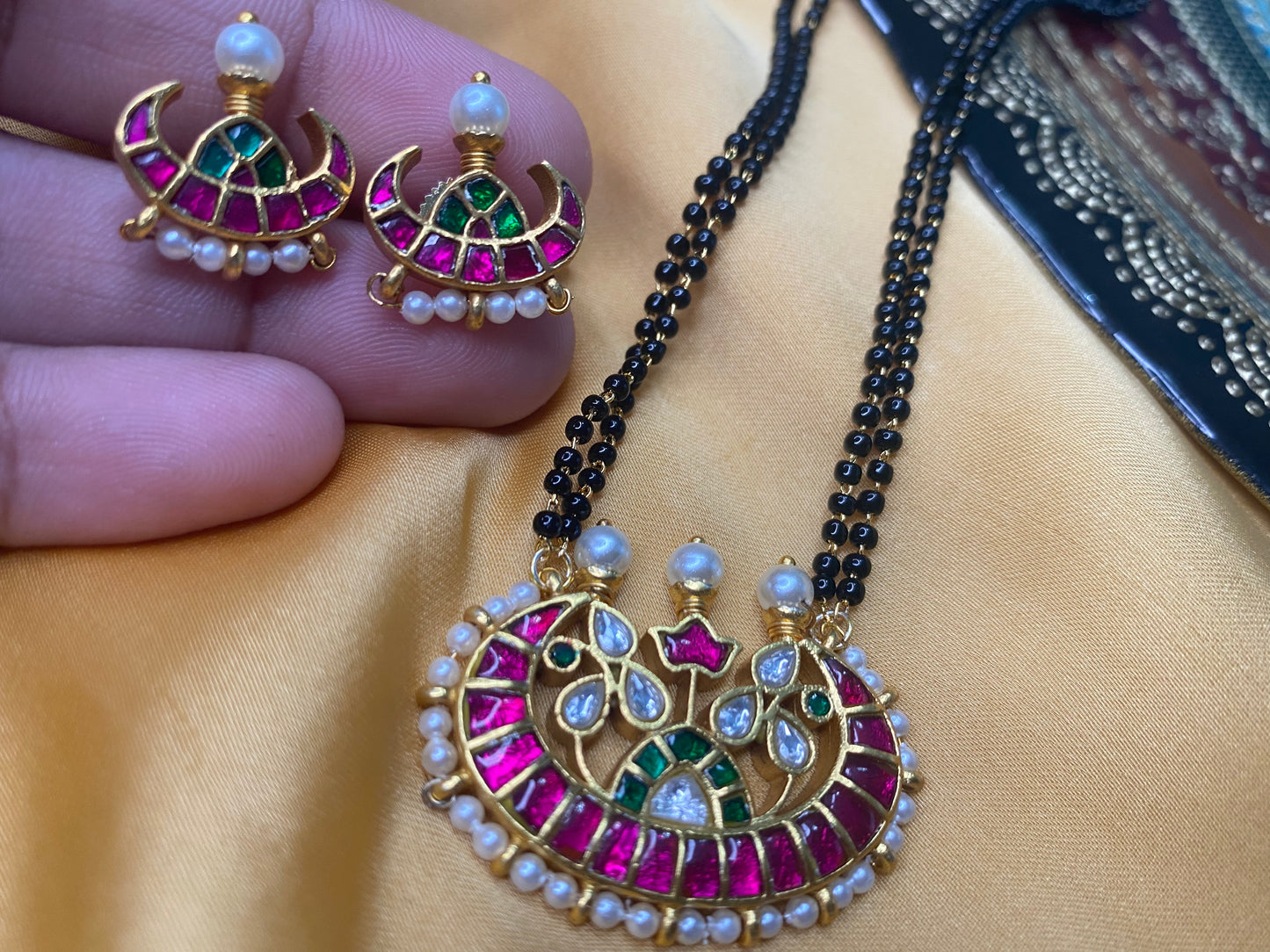 Kundan jadau black bead necklace with studs